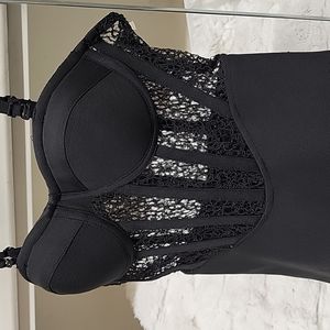 Adorable bra top, lace midriff and stretch scuba like material on bottom